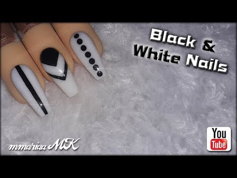 Manicura blanca y negra